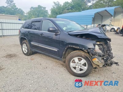 Czwarte zdjęcie samochodu z boku: 2013 JEEP GRAND CHEROKEE LAREDO VIN:1C4RJEAG5DC517599 - miniatura