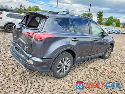 Trzecie zdjęcie samochodu z tyłu: 2018 TOYOTA RAV4 HYBRID XLE VIN:JTMRJREV1JD157706 - miniatura