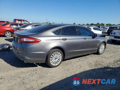 Trzecie zdjęcie samochodu z tyłu: 2013 FORD FUSION SE HYBRID VIN:3FA6P0LU5DR261009 - miniatura