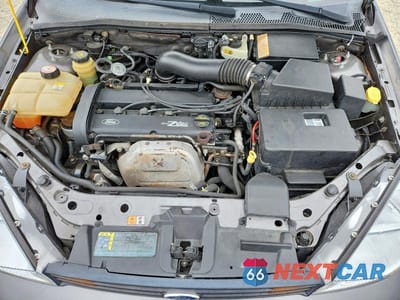 Zdjęcie 11 z 12 samochodu: 2002 FORD FOCUS ZX5 VIN:3FAHP37392R204031 - miniatura