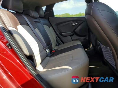 Zdjęcie 11 z 13 samochodu: 2012 HYUNDAI TUCSON LIMITED VIN:KM8JU3AC4CU511013 - miniatura