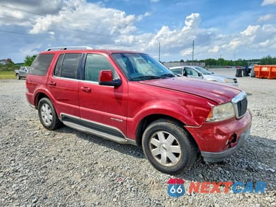 Czwarte zdjęcie samochodu z boku: 2004 LINCOLN TOWNHOUSE AVIATOR VIN:5LMEU68H64ZJ34819 - miniatura
