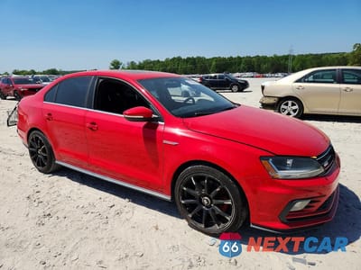Czwarte zdjęcie samochodu z boku: 2017 VOLKSWAGEN JETTA GLI VIN:3VW4T7AJ7HM262676 - miniatura