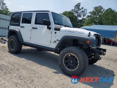 Czwarte zdjęcie samochodu z boku: 2013 JEEP WRANGLER UNLIMITED SAHARA VIN:1C4HJWEG2DL601987 - miniatura