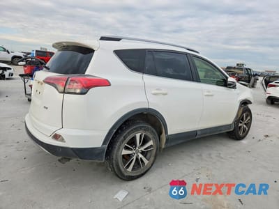 Trzecie zdjęcie samochodu z tyłu: 2017 TOYOTA RAV4 XLE VIN:JTMWFREV2HJ722206 - miniatura