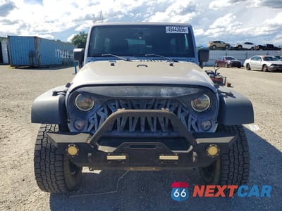 Piąte zdjęcie samochodu w środku: 2014 JEEP WRANGLER UNLIMITED SPORT VIN:1C4BJWDG9EL260578 - miniatura