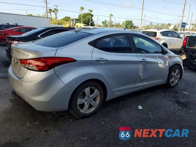 Trzecie zdjęcie samochodu z tyłu: 2012 HYUNDAI ELANTRA GLS VIN:KMHDH4AE1CU401738 - miniatura