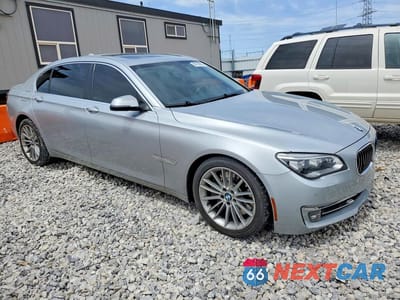 Czwarte zdjęcie samochodu z boku: 2015 BMW 750 LI VIN:WBAYE8C57FD782001 - miniatura