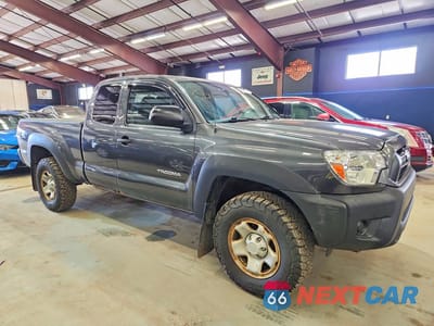 Czwarte zdjęcie samochodu z boku: 2014 TOYOTA TACOMA BASE VIN:5TFUX4EN8EX024120 - miniatura