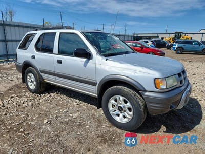 Czwarte zdjęcie samochodu z boku: 2003 ISUZU RODEO S VIN:4S2DM58W734312863 - miniatura