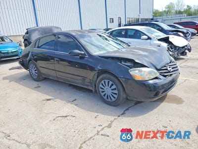 Czwarte zdjęcie samochodu z boku: 2003 NISSAN ALTIMA 2.5 VIN:1N4AL11D73C139487 - miniatura