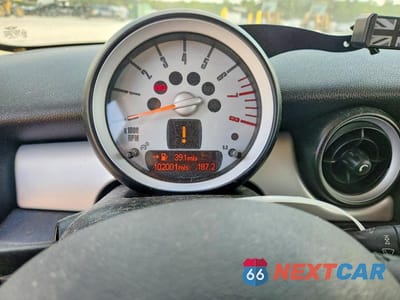Zdjęcie 9 z 12 samochodu: 2009 MINI COOPER VIN:WMWMF33549TU70128 - miniatura