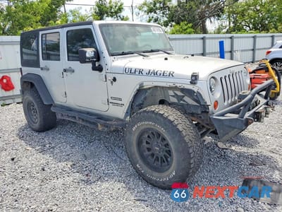 Czwarte zdjęcie samochodu z boku: 2011 JEEP WRANGLER UNLIMITED SPORT VIN:1J4BA3H14BL568476 - miniatura