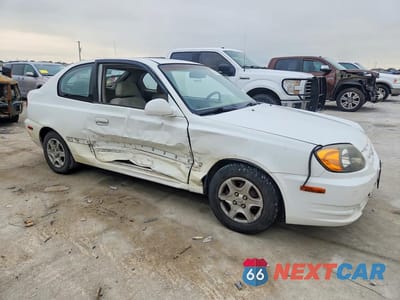 Czwarte zdjęcie samochodu z boku: 2003 HYUNDAI ACCENT GL VIN:KMHCG35C03U261988 - miniatura