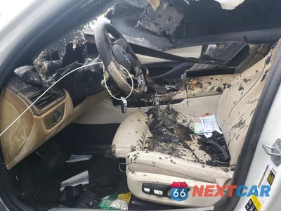 Zdjęcie 7 z 12 samochodu: 2020 BMW 750 XI VIN:WBA7U2C04LCD32651 - miniatura