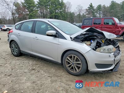 Czwarte zdjęcie samochodu z boku: 2017 FORD FOCUS SE VIN:1FADP3K26HL215749 - miniatura