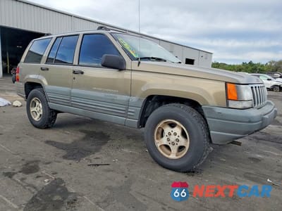 Czwarte zdjęcie samochodu z boku: 1997 JEEP GRAND CHEROKEE LAREDO VIN:1J4GZ58S7VC564865 - miniatura