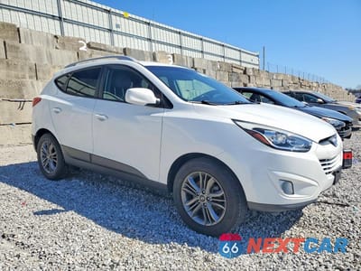 Czwarte zdjęcie samochodu z boku: 2015 HYUNDAI TUCSON SE VIN:KM8JUCAG4FU089803 - miniatura