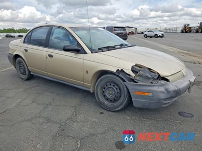 Czwarte zdjęcie samochodu z boku: 1999 SATURN SL1 VIN:1G8ZH528XXZ147250 - miniatura
