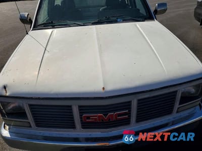 Zdjęcie 11 z 11 samochodu: 1990 GMC SIERRA C2500 VIN:1GTGC24K6LE501933 - miniatura