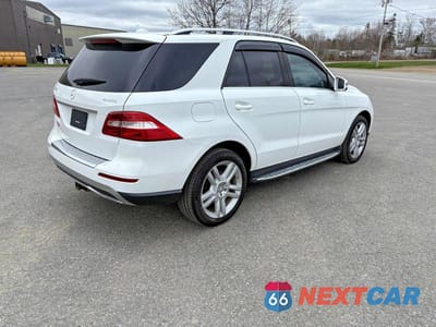 Czwarte zdjęcie samochodu z boku: 2015 MERCEDES-BENZ ML 350 4MATIC VIN:4JGDA5HB3FA579825 - miniatura