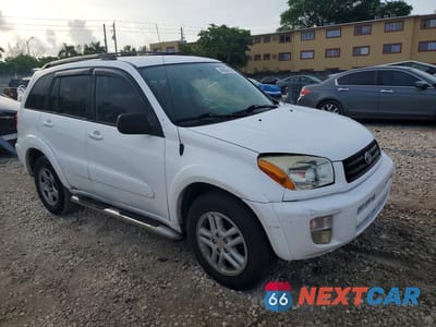 Czwarte zdjęcie samochodu z boku: 2002 TOYOTA RAV4 BASE VIN:JTEGH20VX20063569 - miniatura