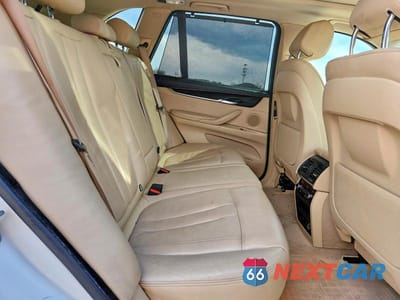 Zdjęcie 11 z 13 samochodu: 2014 BMW X5 XDRIVE35I VIN:5UXKR0C5XE0H25099 - miniatura