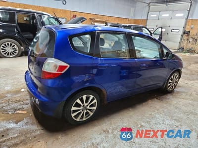 Trzecie zdjęcie samochodu z tyłu: 2010 HONDA FIT VIN:JHMGE8H23AC012131 - miniatura