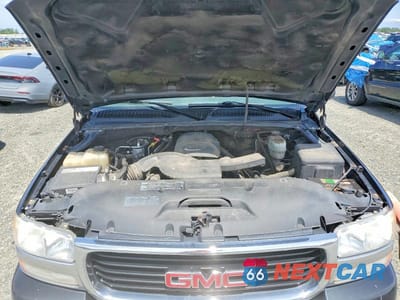 Zdjęcie 12 z 14 samochodu: 2005 GMC YUKON XL K1500 VIN:3GKFK16Z35G165600 - miniatura