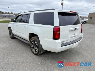 Trzecie zdjęcie samochodu z tyłu: 2016 CHEVROLET SUBURBAN K1500 LT VIN:1GNSKHKC5GR468229 - miniatura