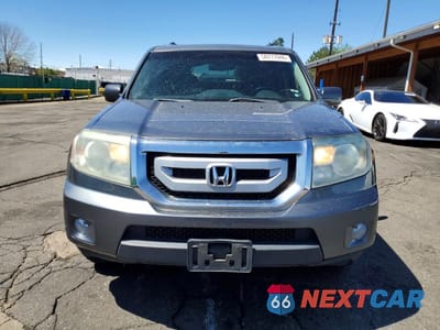 Piąte zdjęcie samochodu w środku: 2010 HONDA PILOT TOURING VIN:5FNYF4H83AB021401 - miniatura