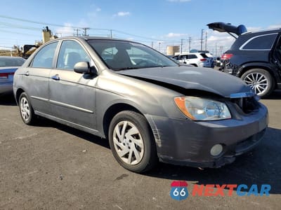 Czwarte zdjęcie samochodu z boku: 2005 KIA SPECTRA VIN:KNAFE122355204590 - miniatura