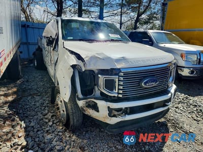 Czwarte zdjęcie samochodu z boku: 2020 FORD F450 SUPER DUTY VIN:1FT8W4DT4LEE71752 - miniatura