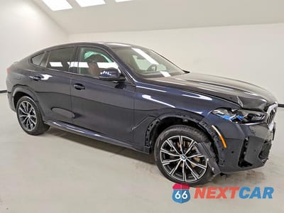 Czwarte zdjęcie samochodu z boku: 2026 BMW X6 XDRIVE40I VIN:5UX33EX00T9135825 - miniatura
