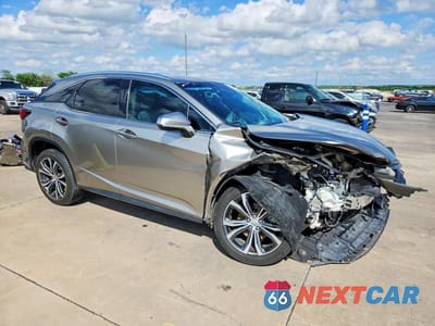 Czwarte zdjęcie samochodu z boku: 2017 LEXUS RX 350 BASE VIN:2T2ZZMCA9HC056217 - miniatura