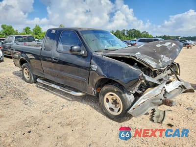 Czwarte zdjęcie samochodu z boku: 1999 FORD F150 VIN:1FTRX17L7XKA20463 - miniatura