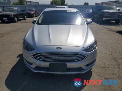 Piąte zdjęcie samochodu w środku: 2017 FORD FUSION SE HYBRID VIN:3FA6P0LU5HR314149 - miniatura
