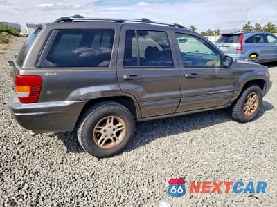 Trzecie zdjęcie samochodu z tyłu: 1999 JEEP GRAND CHEROKEE LIMITED VIN:1J4GW68N2XC677361 - miniatura