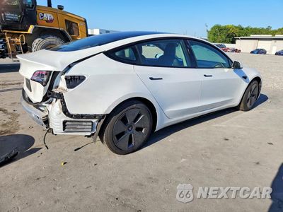 Trzecie zdjęcie samochodu z tyłu: 2021 TESLA 3 VIN:5YJ3E1EA3MF911419 - miniatura