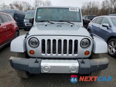 Piąte zdjęcie samochodu w środku: 2013 JEEP WRANGLER UNLIMITED SAHARA VIN:1C4HJWEG8DL571605 - miniatura