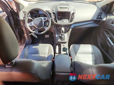 Zdjęcie 8 z 13 samochodu: 2014 FORD ESCAPE TITANIUM VIN:1FMCU9JX8EUA77258 - miniatura