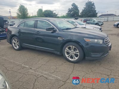 Czwarte zdjęcie samochodu z boku: 2014 FORD TAURUS SEL VIN:1FAHP2H87EG161227 - miniatura