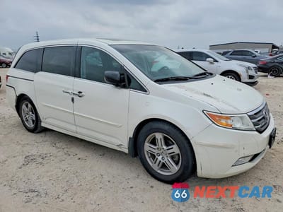 Czwarte zdjęcie samochodu z boku: 2012 HONDA ODYSSEY TOURING VIN:5FNRL5H93CB017153 - miniatura