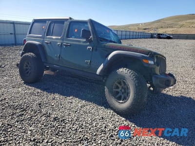 Czwarte zdjęcie samochodu z boku: 2021 JEEP WRANGLER UNLIMITED RUBICON VIN:1C4JJXFM7MW536211 - miniatura