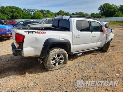 Trzecie zdjęcie samochodu z tyłu: 2019 TOYOTA TACOMA TRD SPORT VIN:3TMCZ5ANXKM203259 - miniatura
