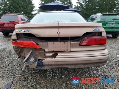 Zdjęcie 6 z 12 samochodu: 1992 FORD TAURUS GL VIN:1FACP52U8NG231691 - miniatura