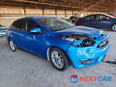 Czwarte zdjęcie samochodu z boku: 2015 FORD FOCUS SE VIN:1FADP3F22FL211110 - miniatura