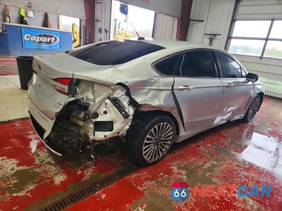 Trzecie zdjęcie samochodu z tyłu: 2017 FORD FUSION SE VIN:3FA6P0T9XHR101564 - miniatura