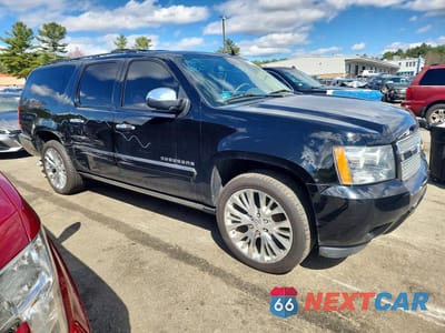 Czwarte zdjęcie samochodu z boku: 2014 CHEVROLET SUBURBAN K1500 LTZ VIN:1GNSKKE77ER149892 - miniatura