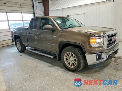 Czwarte zdjęcie samochodu z boku: 2015 GMC SIERRA K1500 SLE VIN:1GTV2UEC2FZ329734 - miniatura